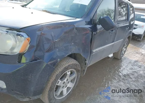 2009 Honda Pilot Touring z USA, uszkodzony, nr VIN 5FNYF48879B017069